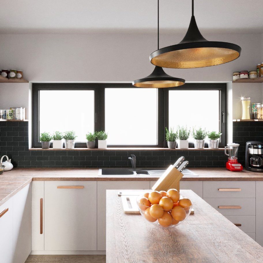 Modern kitchen with white cabinets, wooden countertops, and a black subway tile backsplash under large windows.