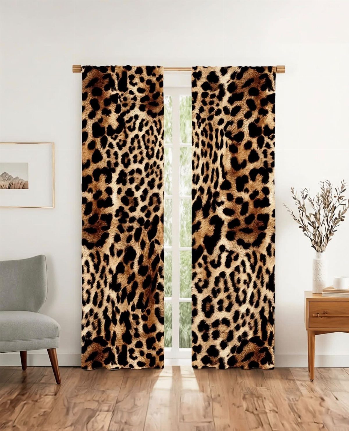Leopard print curtains hanging on a wooden rod in a bright, modern living room.