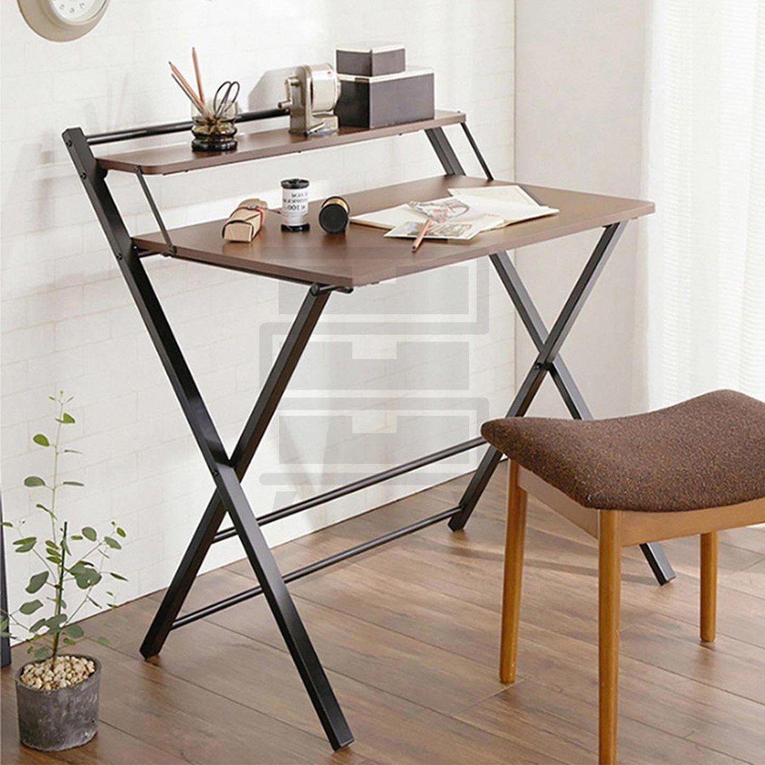 A compact two-tier wooden desk with black metal legs and a brown stool.