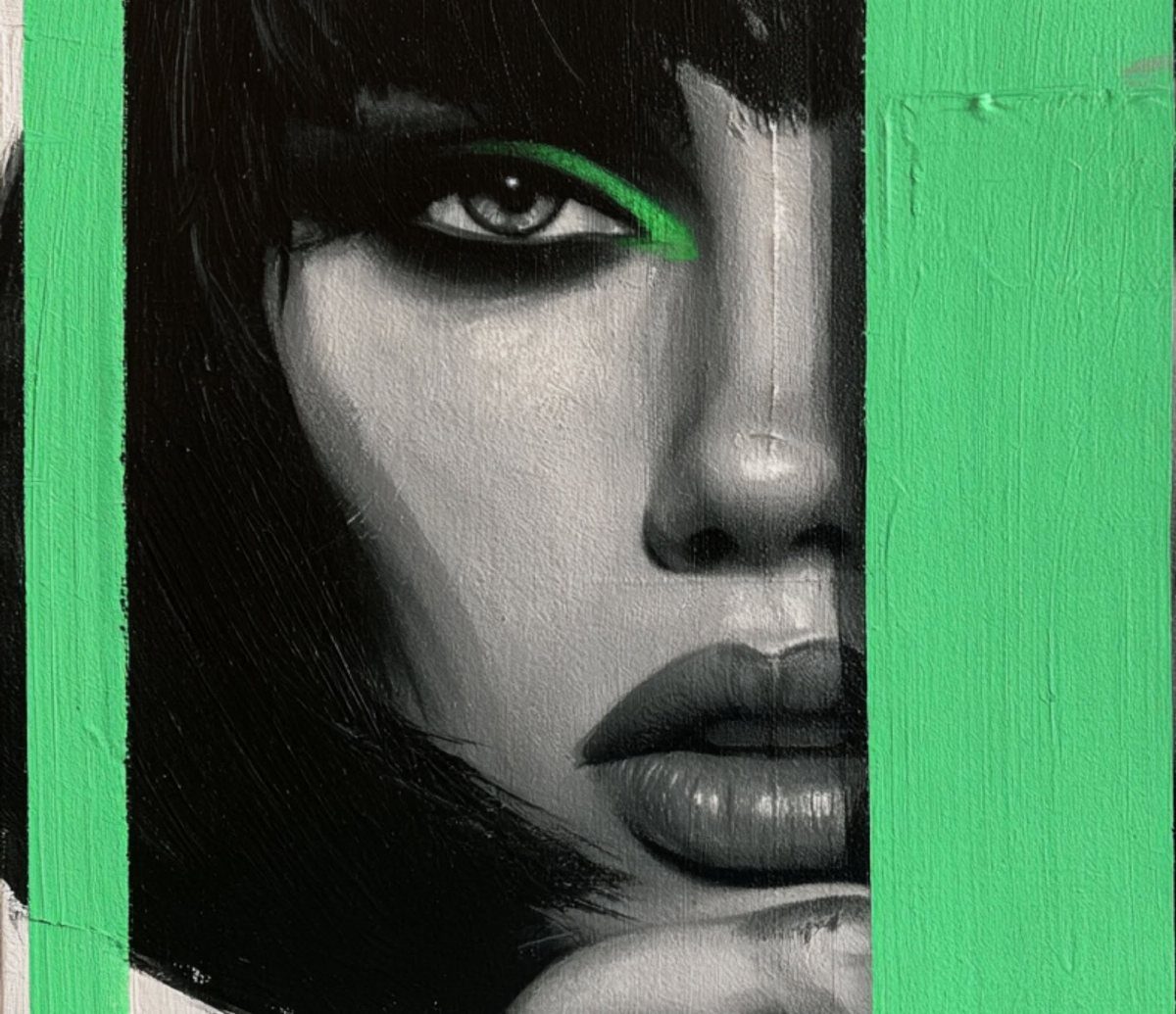 Black and white portrait of a woman with bright green eye makeup and vertical green stripes.