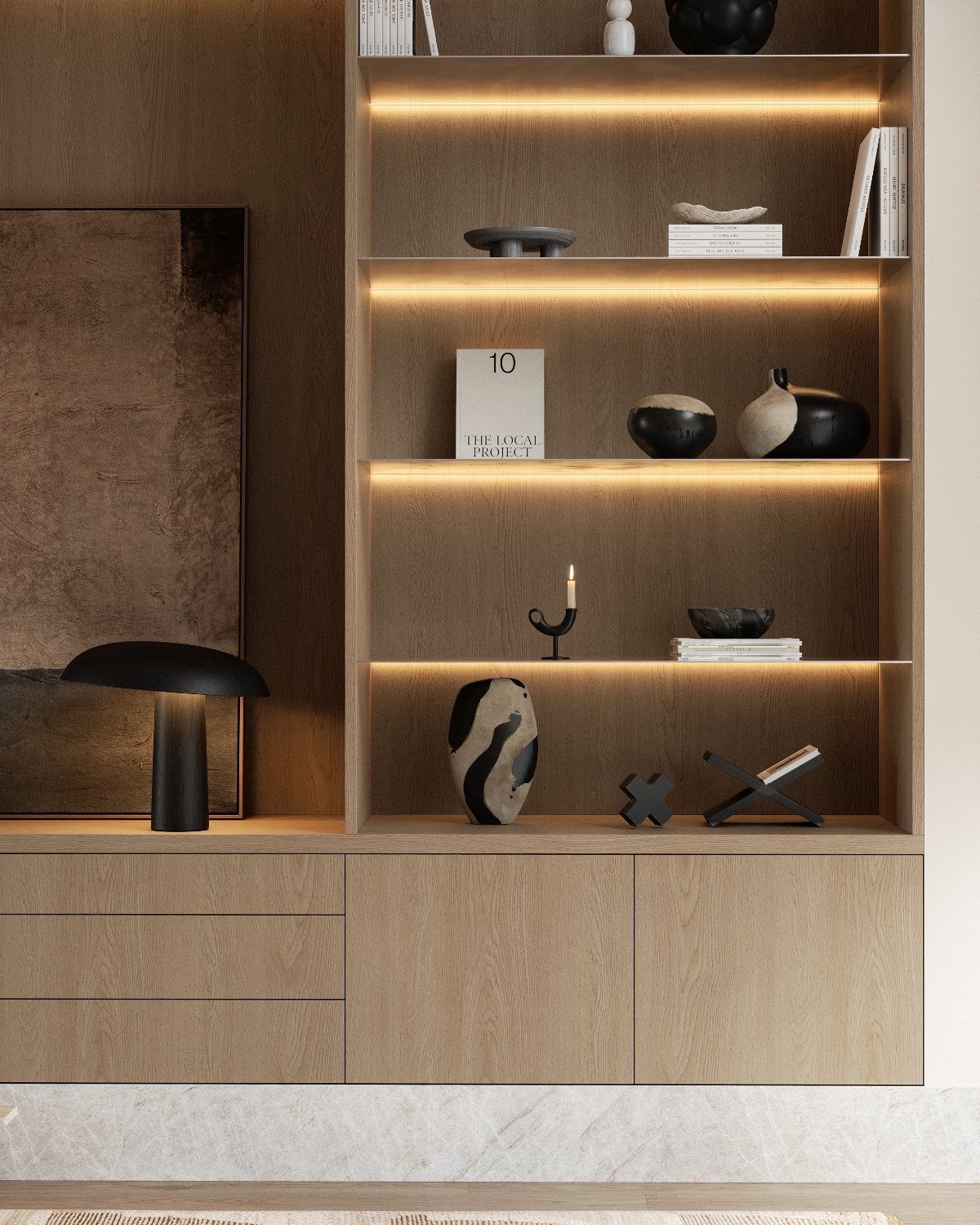 Built-in wooden shelving unit with integrated warm LED lighting and minimalist decor objects.