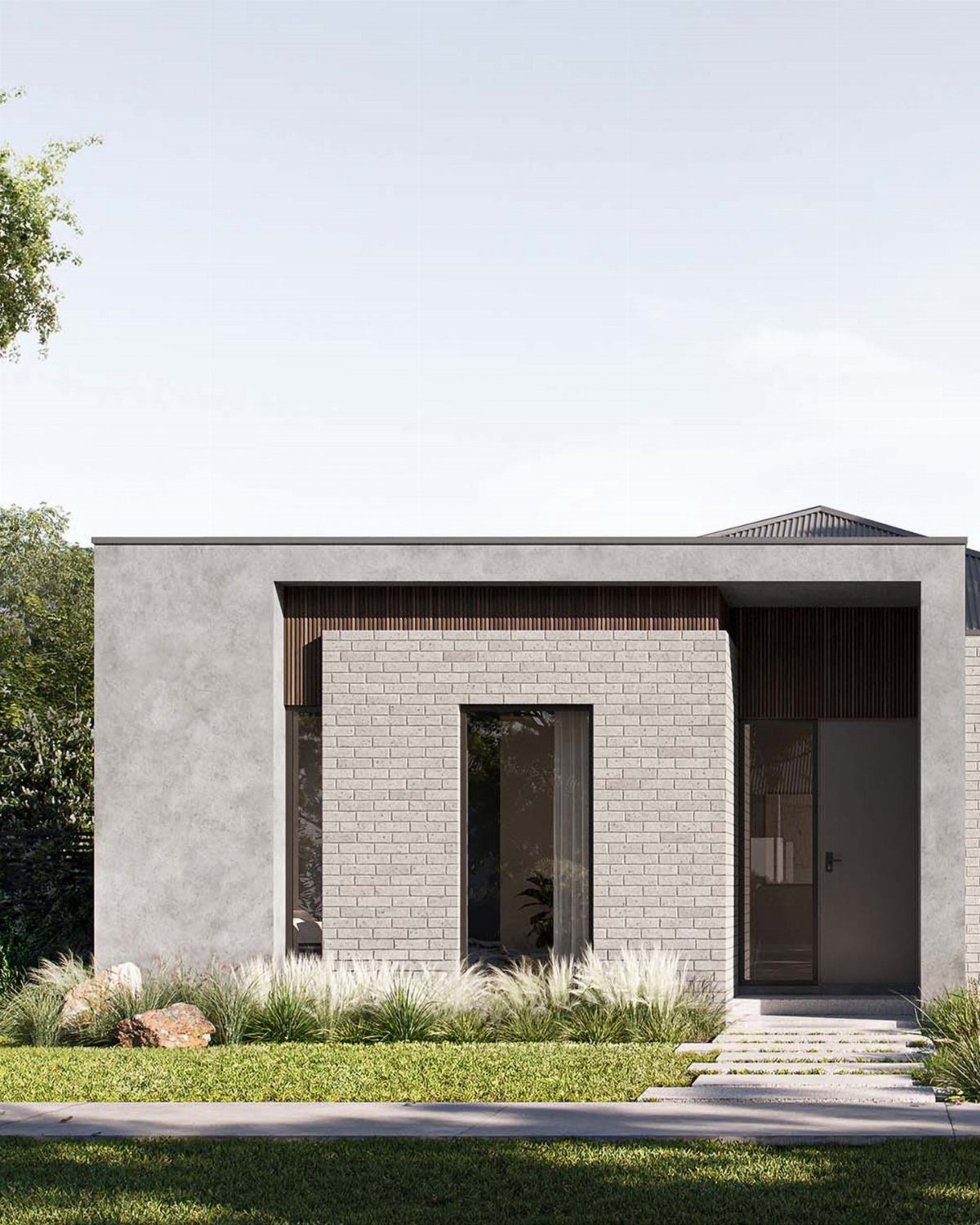 Modern grey house with brick walls, wood accents, and a manicured green lawn.