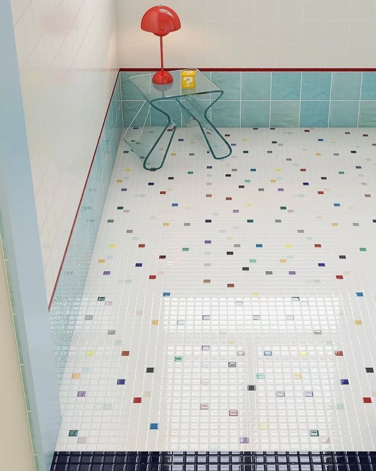 White mosaic floor tiles with colorful accents and light blue wall tiles in a bathroom.