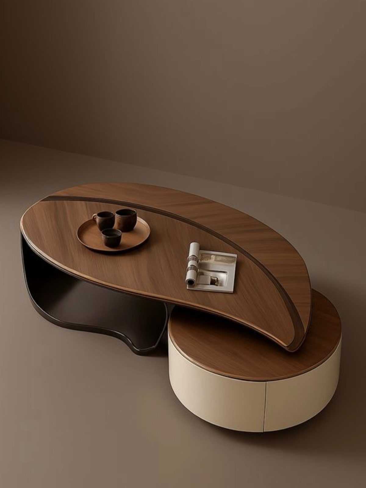 An oval wooden coffee table with a dark hollow base next to a circular cream storage ottoman.