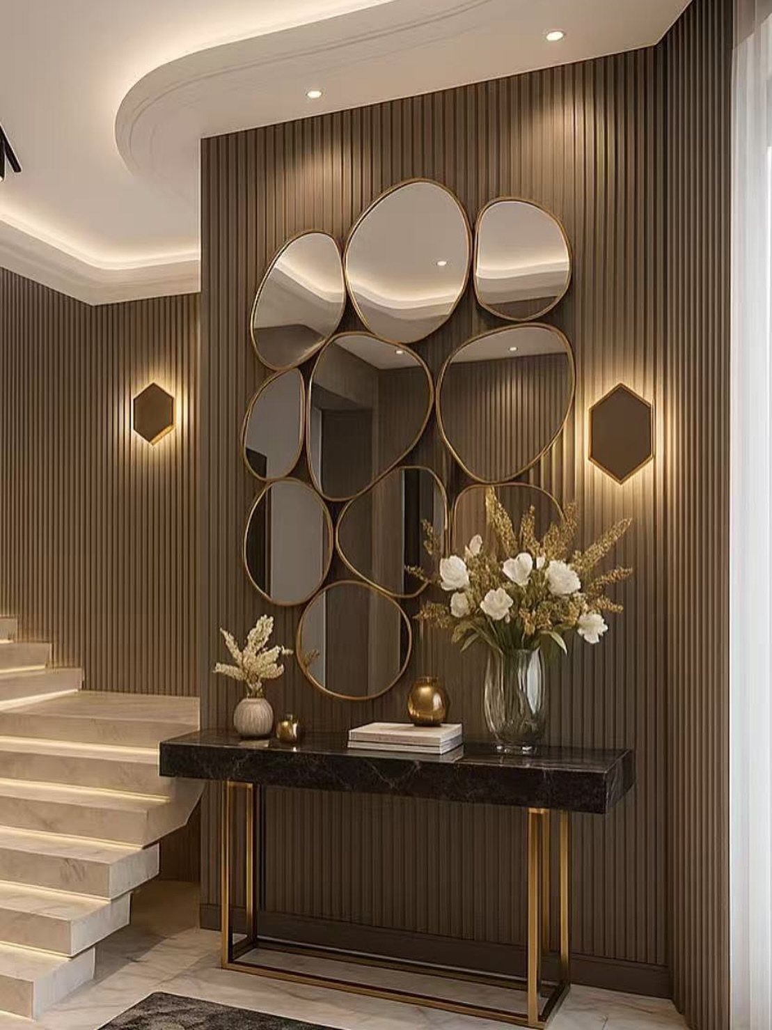 Organic shaped gold-framed mirrors mounted on a brown fluted wall above a marble console table.