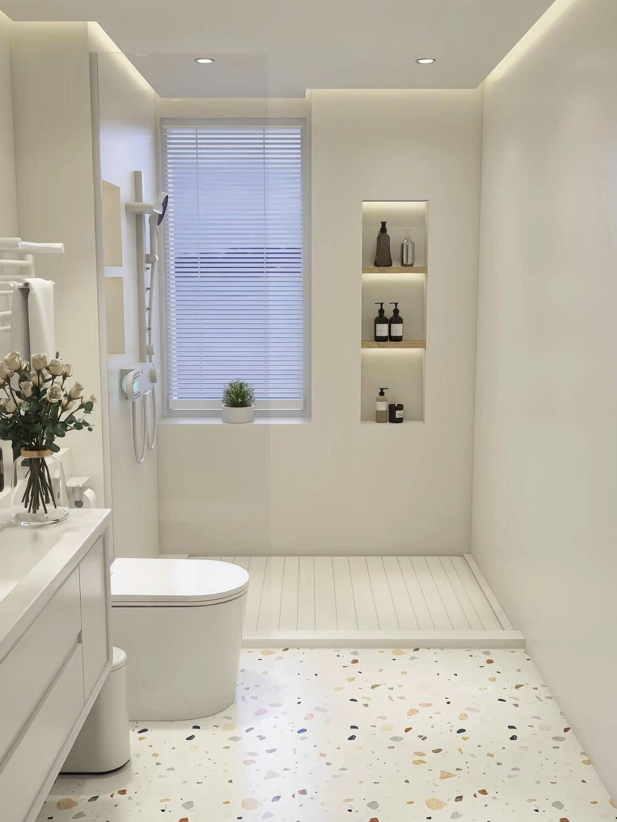 Modern white bathroom with taupe walls, terrazzo flooring, and recessed wall shelving.